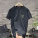 2025 Summer New Men's Short-sleeved Back Letter Printing Round Neck Trendy Half-sleeved Slim-fitting Casual Handsome T-shirt_viptrois.com