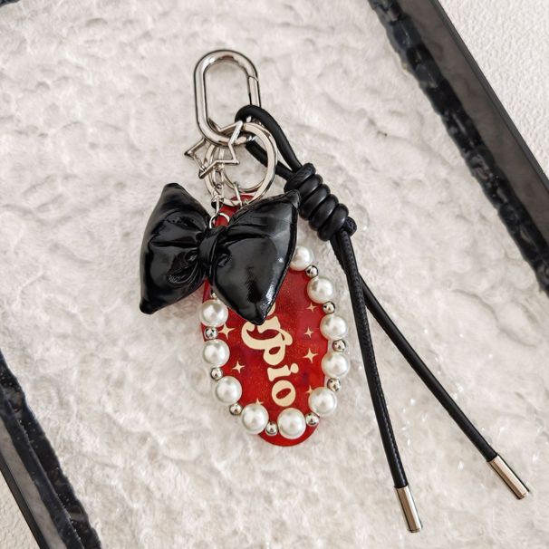 Bag Pendant Simple And Elegant Bow Woven Leather Rope Pearl Chain Pendant Keychain_viptrois.com